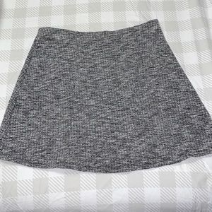 Size Medium stretchy mini skirt from H & M‎